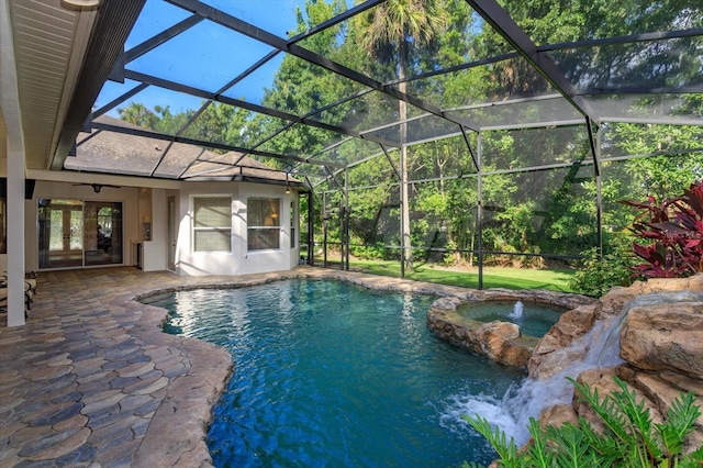 view of pool featuring an in ground hot tub, a lanai, ceiling fan, and a patio area