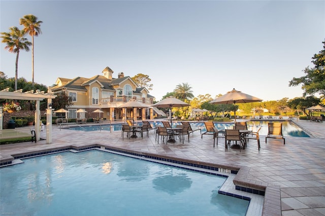 view of swimming pool featuring a patio