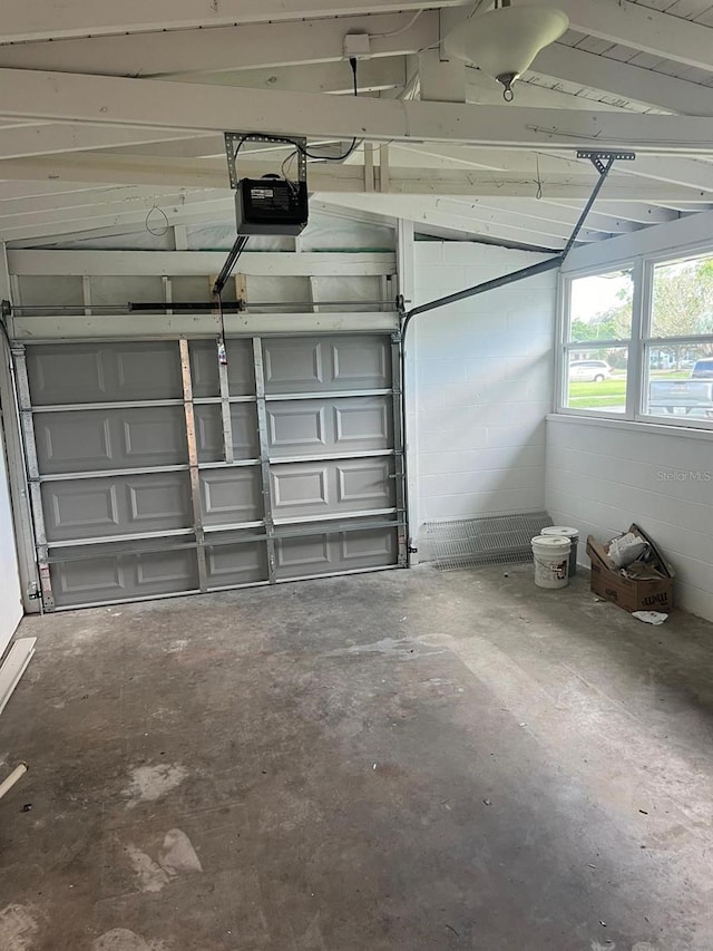 garage featuring a garage door opener