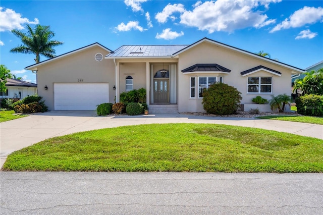 single story home with a front yard and a garage