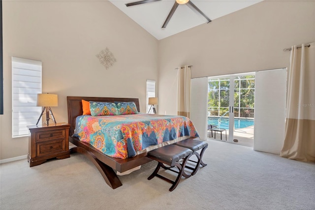 bedroom with access to exterior, high vaulted ceiling, ceiling fan, and light colored carpet