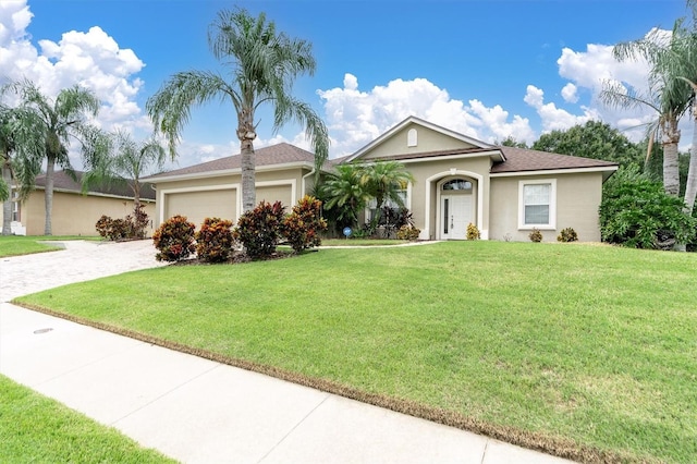 ranch-style house with a front yard and a garage