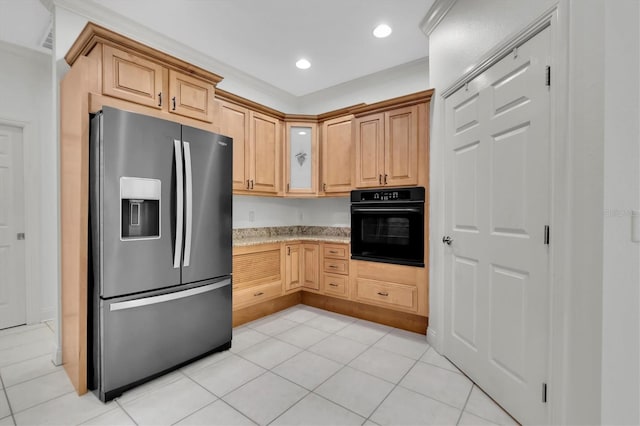 kitchen featuring stainless steel fridge with ice dispenser, light tile patterned floors, oven, and light brown cabinetry