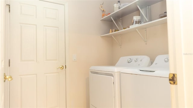 laundry area featuring washer and clothes dryer