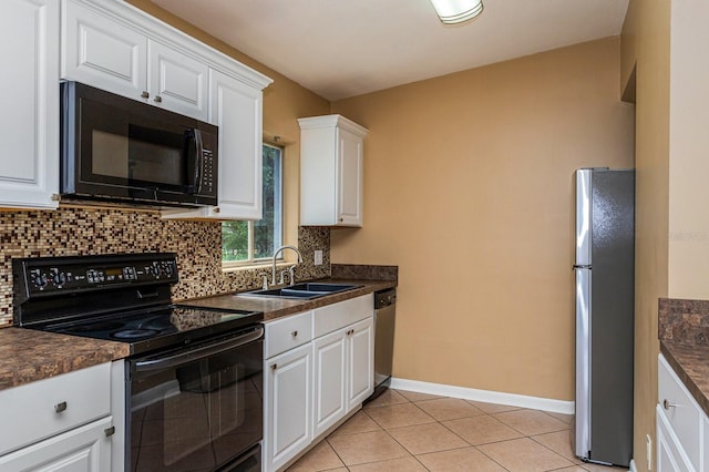 kitchen featuring black appliances, backsplash, white cabinets, and sink