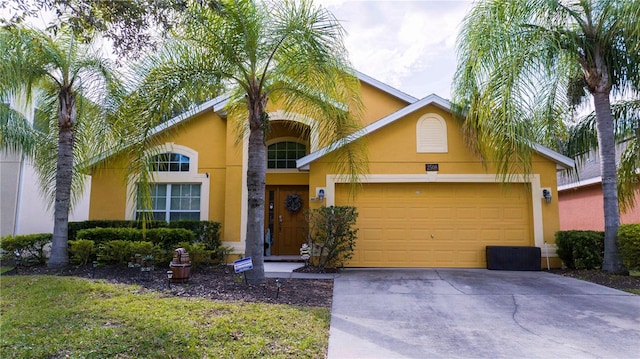 view of front of home with a garage