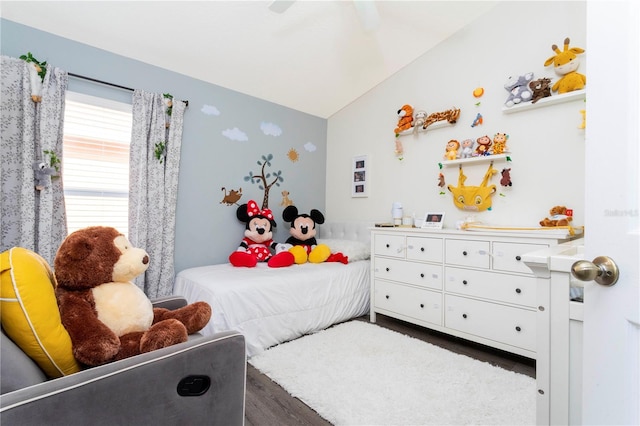 bedroom featuring lofted ceiling, ceiling fan, and dark wood-type flooring