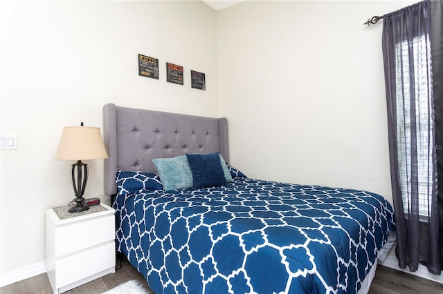 bedroom featuring wood-type flooring