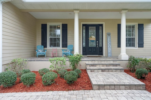 property entrance with covered porch