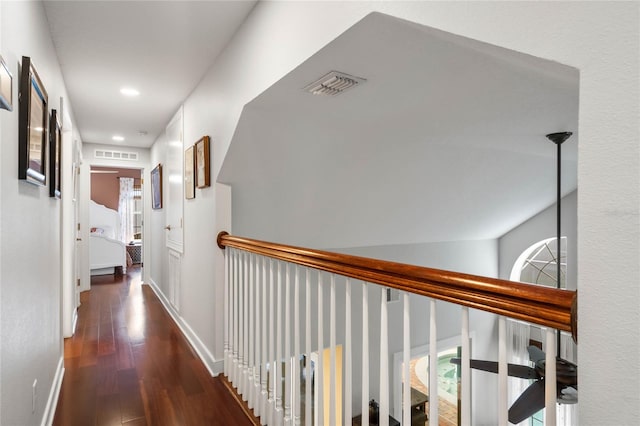 corridor with dark wood-type flooring