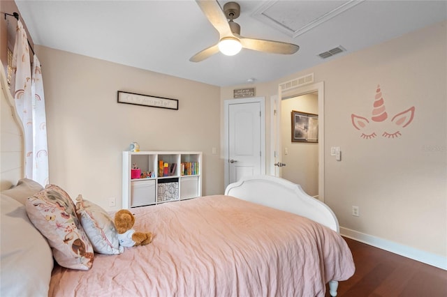 bedroom featuring hardwood / wood-style floors and ceiling fan