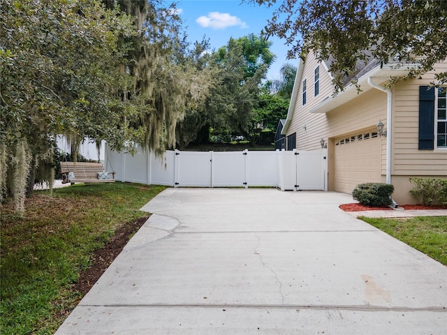 view of property exterior with a lawn