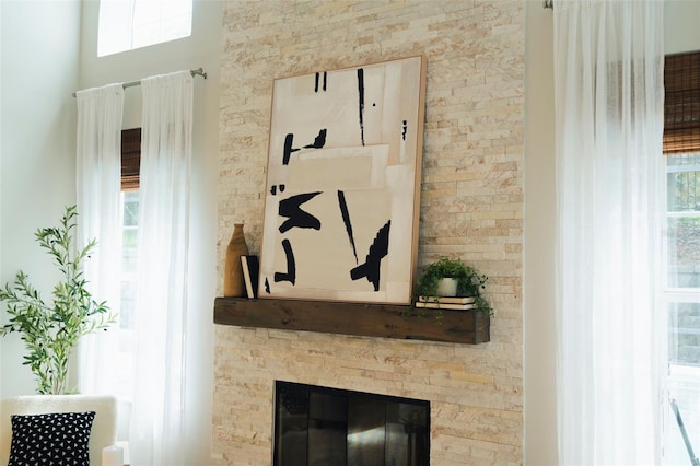 details featuring a stone fireplace