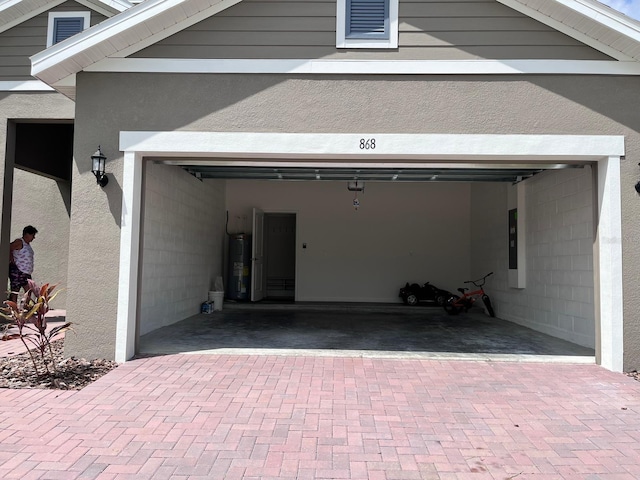 garage with electric water heater