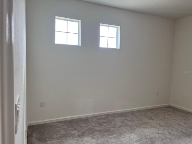 view of carpeted spare room