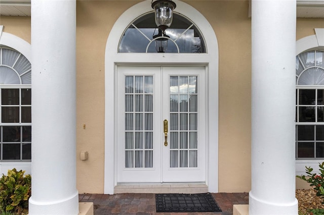 doorway to property featuring french doors