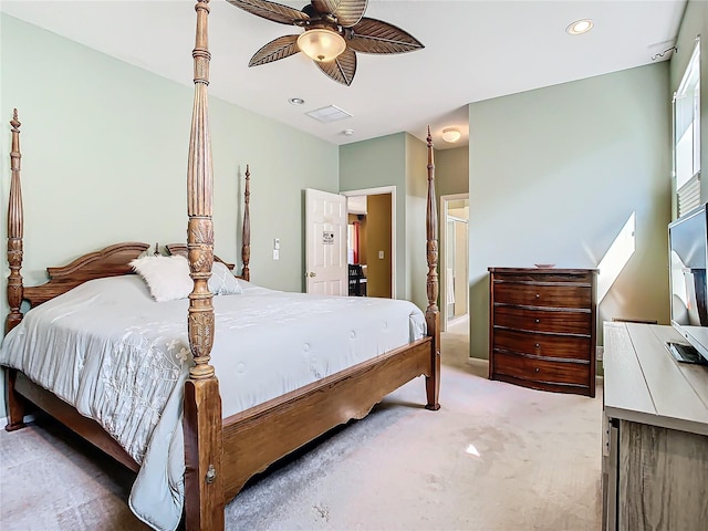 carpeted bedroom featuring ceiling fan