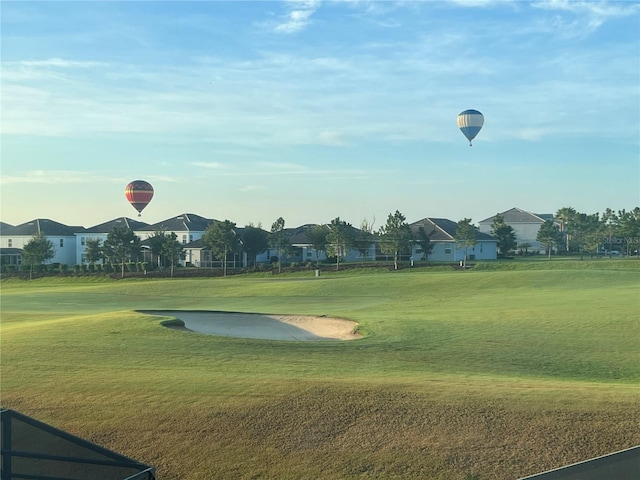8920 Dove Valley Way, Davenport, FL 33896 - view of property's community with a residential view, view of golf course, and a lawn