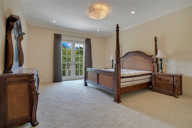 carpeted bedroom featuring access to exterior, crown molding, and french doors