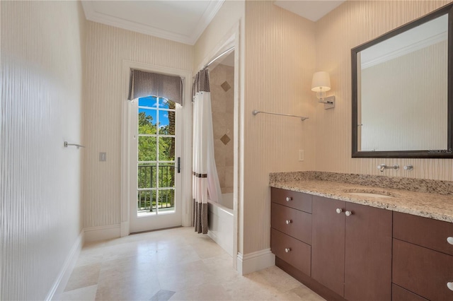 bathroom featuring vanity, crown molding, and shower / bath combo with shower curtain