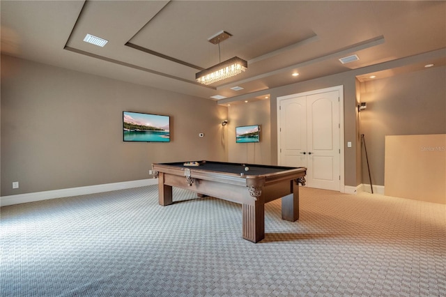 rec room featuring light colored carpet, a raised ceiling, and pool table