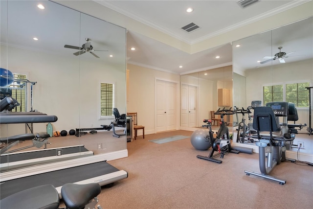 gym featuring ceiling fan and crown molding