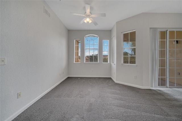 carpeted empty room with ceiling fan