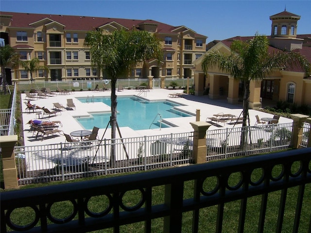 view of pool featuring a patio