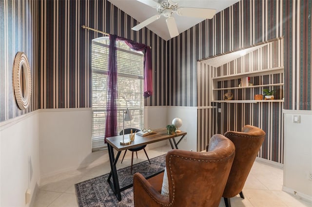 office space with a ceiling fan, light tile patterned floors, and wallpapered walls