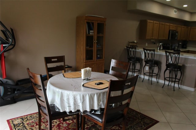 view of tiled dining space