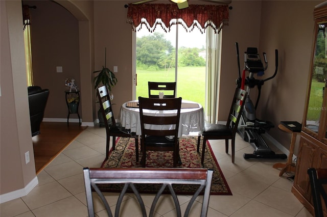 dining area with light tile patterned floors