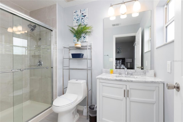 3052 Secret Lake Dr, Kissimmee, FL 34747 - bathroom featuring vanity, ensuite bathroom, and a stall shower