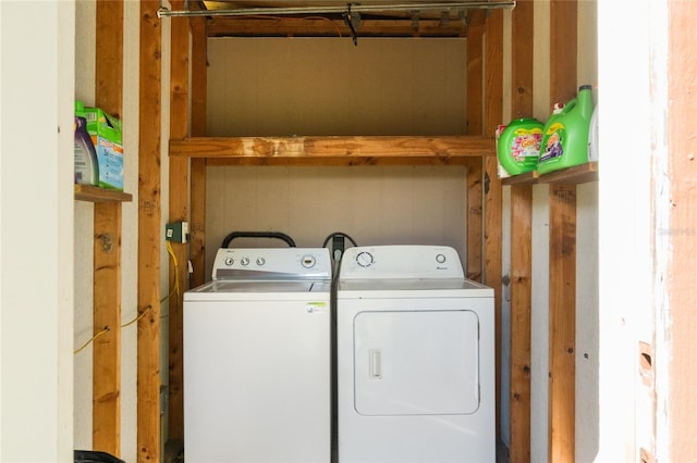 laundry area with washing machine and dryer