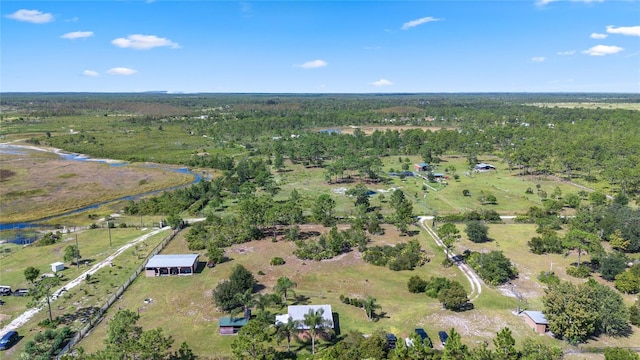 birds eye view of property featuring a rural view