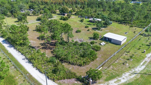 birds eye view of property featuring a rural view