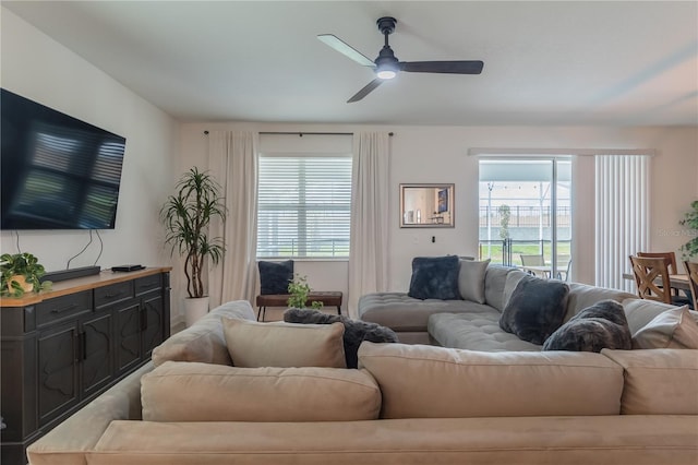 living room featuring ceiling fan