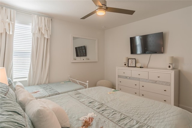 bedroom featuring ceiling fan