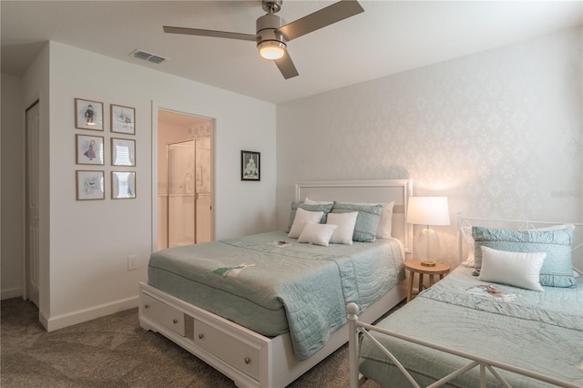 carpeted bedroom featuring visible vents, baseboards, ceiling fan, and wallpapered walls