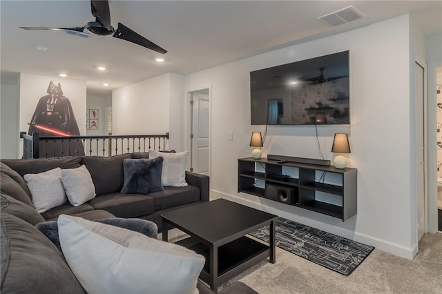 carpeted living room with recessed lighting, visible vents, baseboards, and ceiling fan