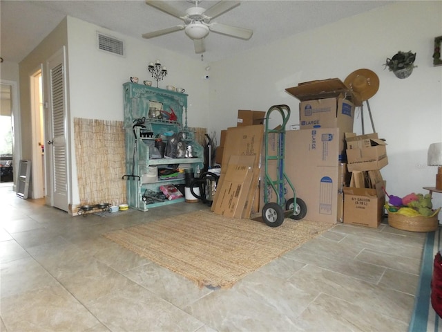 storage area featuring ceiling fan