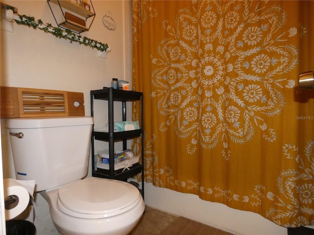 bathroom featuring toilet