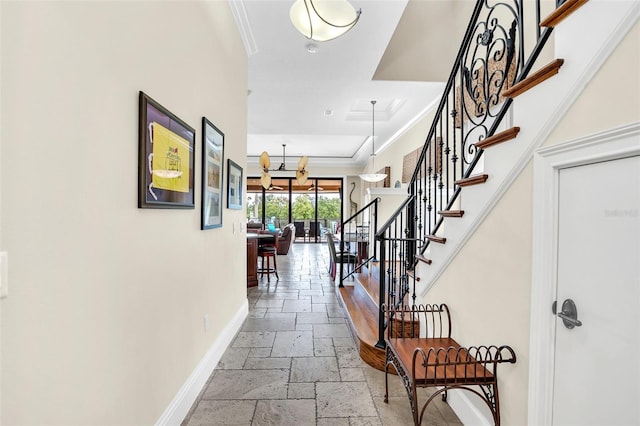 hallway featuring ornamental molding