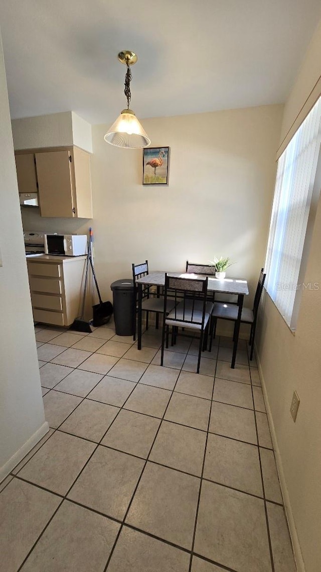 view of tiled dining space