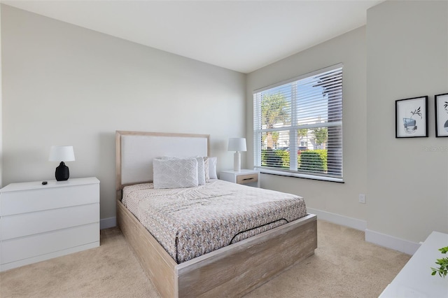 bedroom with light carpet