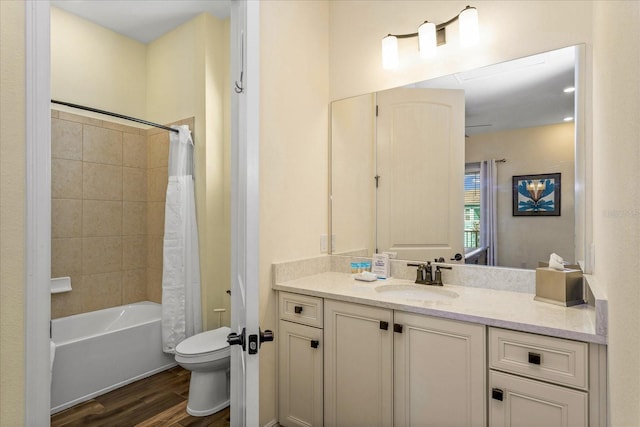 full bathroom featuring vanity, toilet, shower / bath combo, and hardwood / wood-style flooring