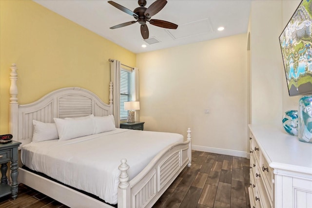 bedroom with ceiling fan and dark wood-type flooring