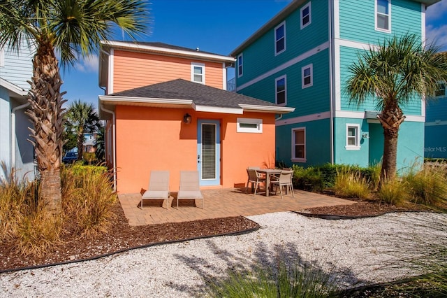 back of house featuring a patio