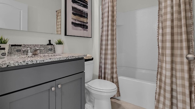 full bathroom with shower / bath combination with curtain, vanity, and toilet