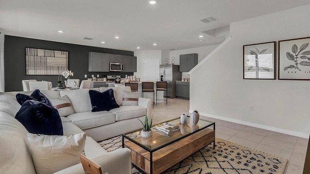 living room with light tile patterned floors