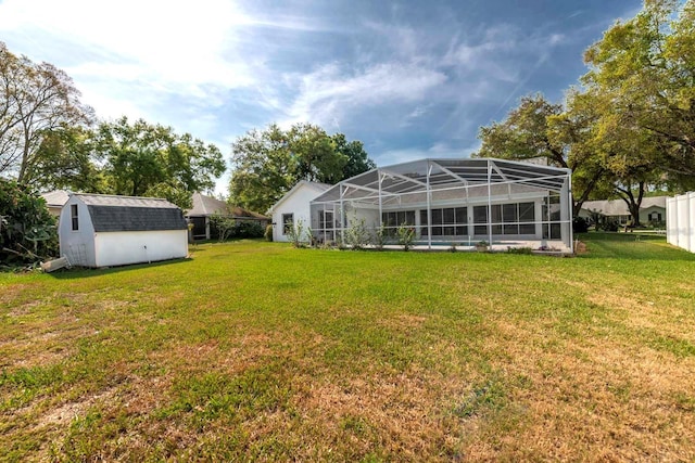 view of yard with a storage unit and a lanai